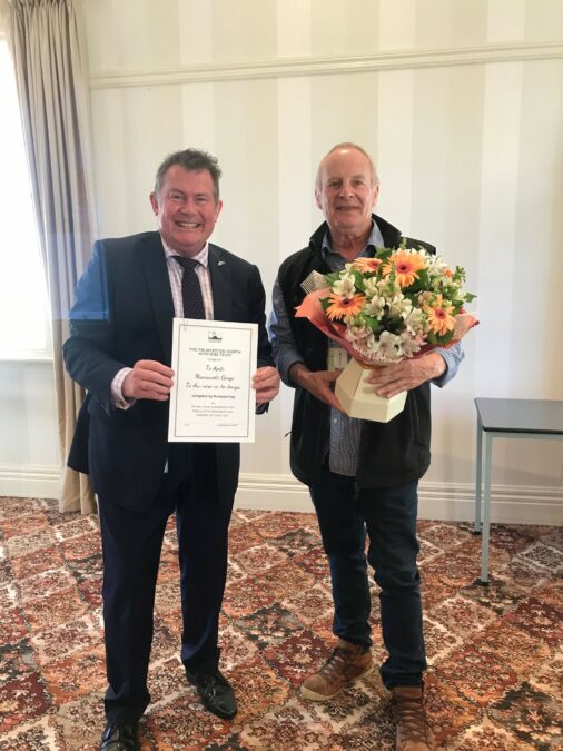Palmerston North Mayor Grant Smith with award for Manawatu Gorge book